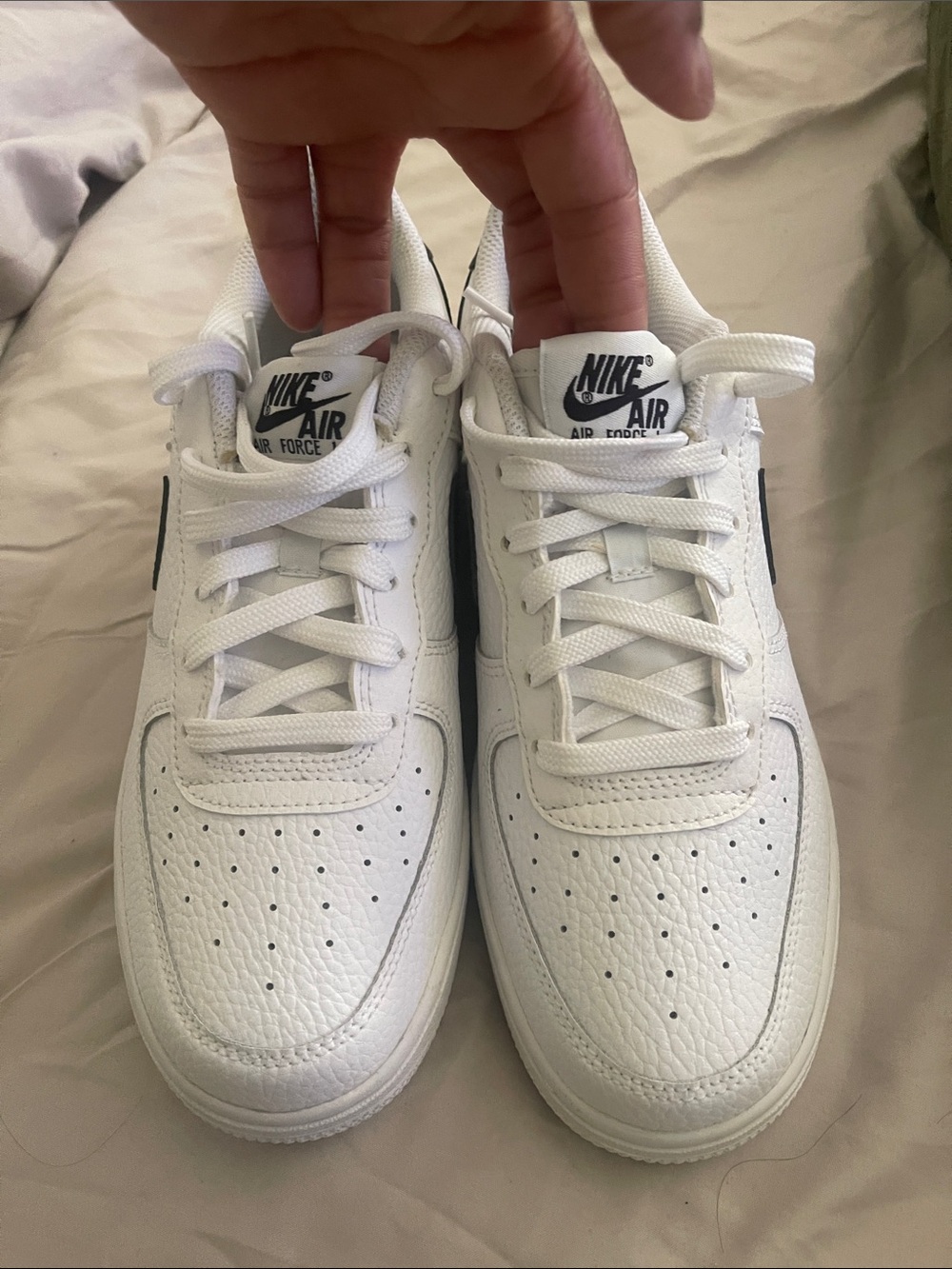 Nike White Low-Top Sneakers with Black Logo
